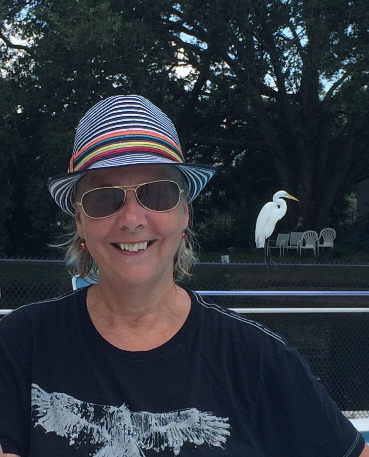 portriat of Sophia Wien with an egret in the background.